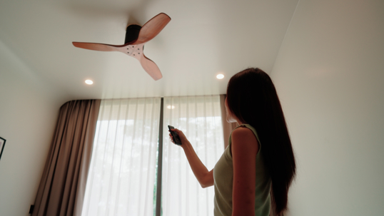Turning on and off a ceiling fan.